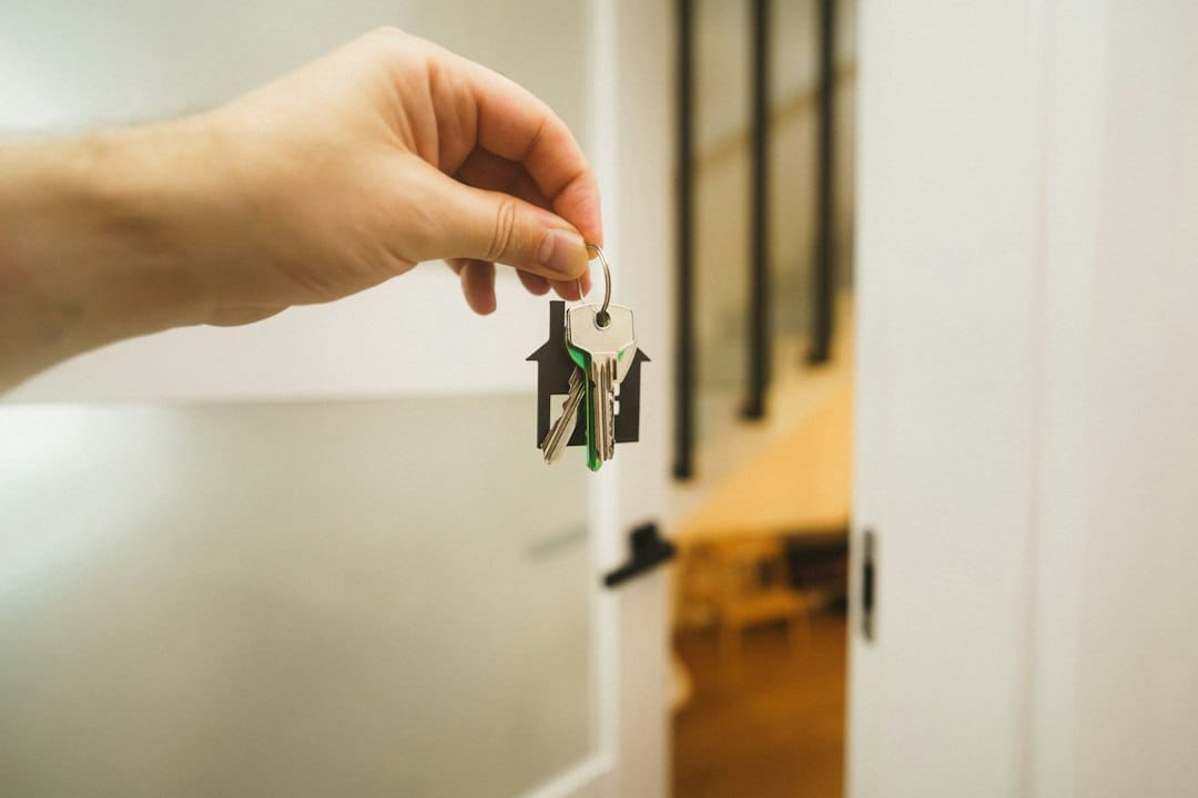 House key being handed over at completion of a property sale